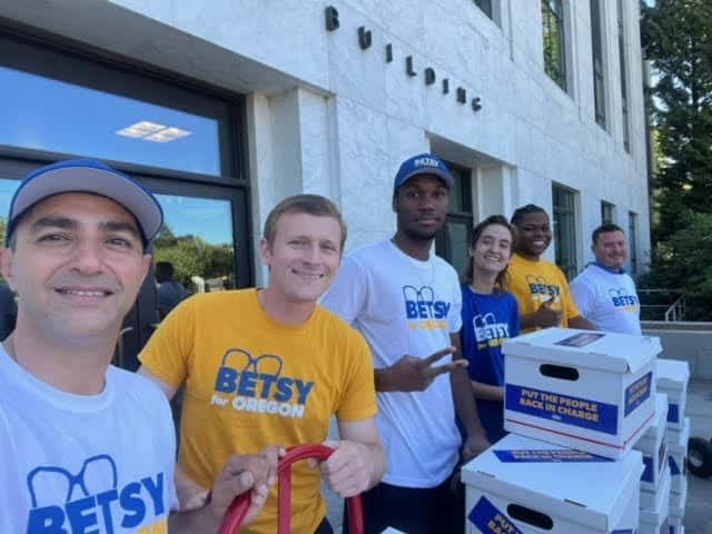 Canvassing crew preparing campaign materials outside a field office