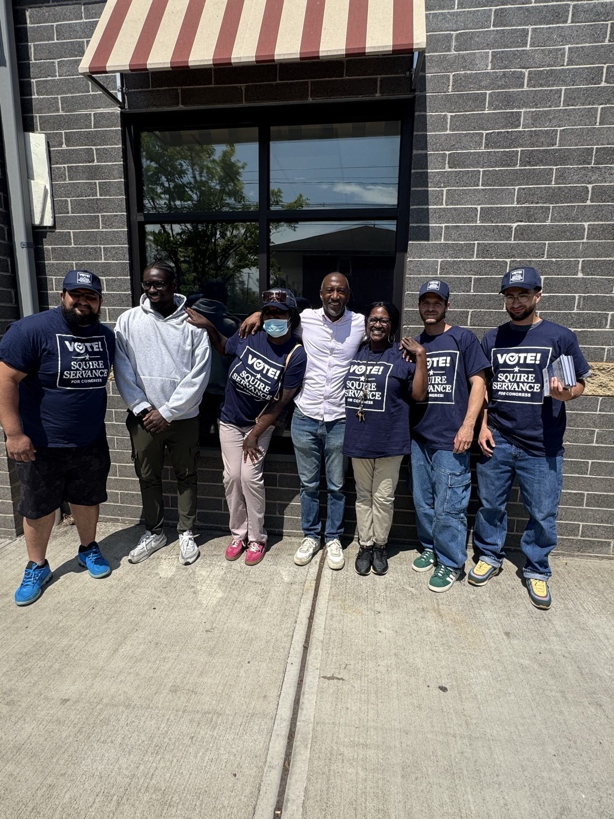 Campaign canvassers standing together before heading into the field
